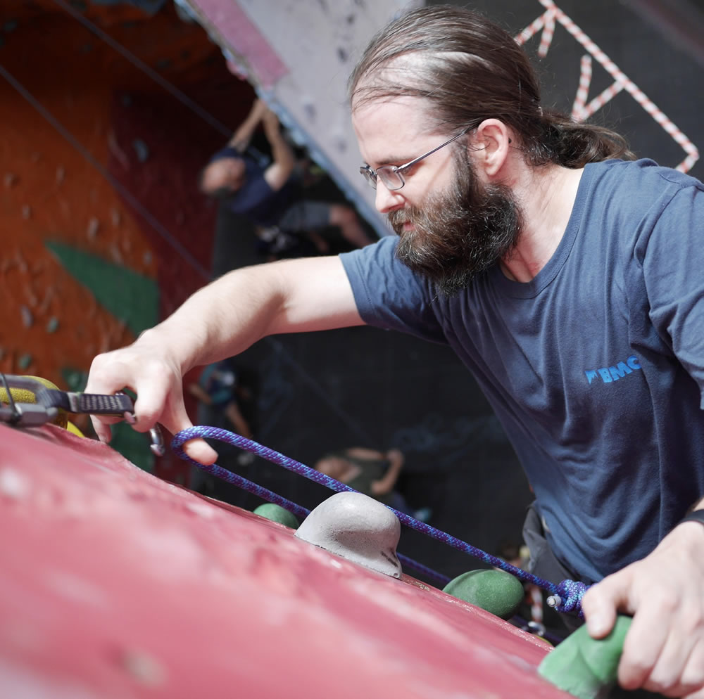 Adult lead climbing